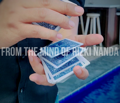 Box Out by Rizki Nanda - et meget visuelt og magisk trick hvor kortene trænger igennem kortæsken